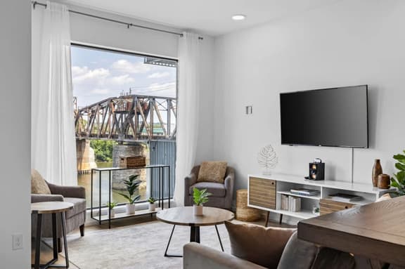 River View 2-Bedroom Apartment with Free Garage Parking